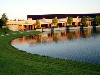 artificial lake and dining area behind